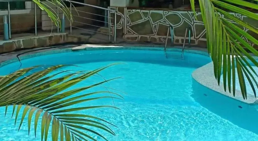 Merry Villa Hotel & Apartments - Image 1