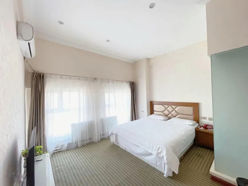 Si Ning Business Hotel (Binxi Xingbin Avenue Branch) - Image 1