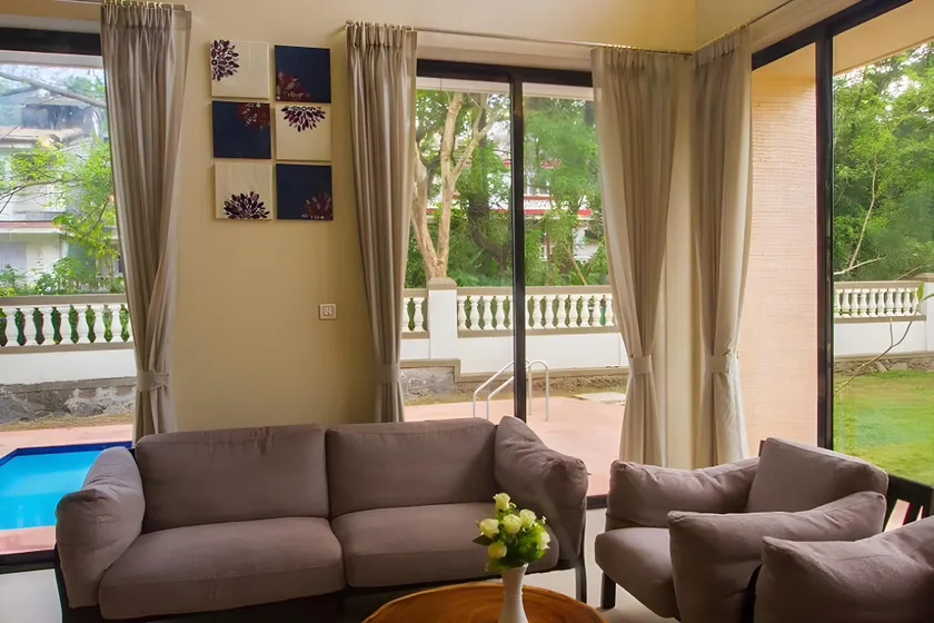 StayVista's Greenwoods Villa 10 - City-Center Villa with Private Pool, Terrace, Lift & Carrom Board - Image 1