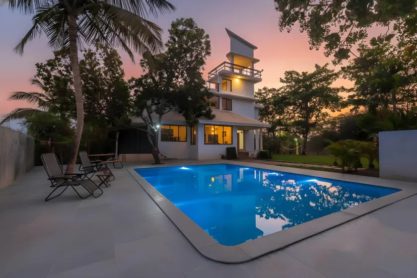 StayVista's Santoni Farms - Riverside Bliss with Pool, Orchard & Activities - Image 1