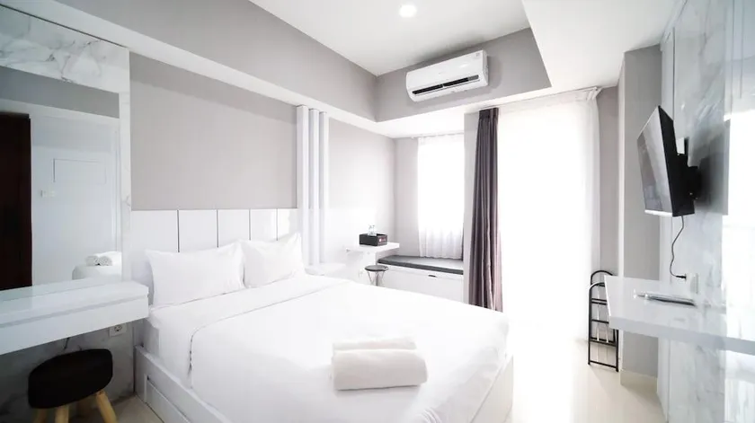 Nice And Comfy Studio Grand Dharmahusada Lagoon Apartment - Image 1