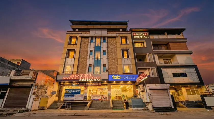 FabHotel Signature Inn - Image 1