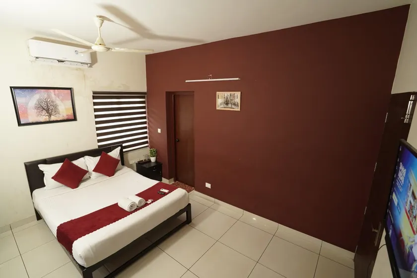 Atmos Inn Calicut Near Aster Mims Hospital - Image 1