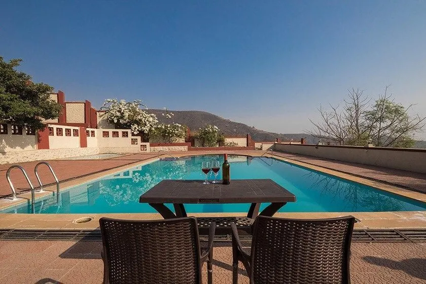 Villa Dazzle by StayVista - Unwind in a Mountain-City View Villa with a Terrace Pool - Image 1
