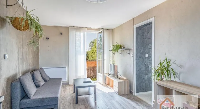 Jolie T3 50m² (+-), balcon, parking, commodités - Image 1