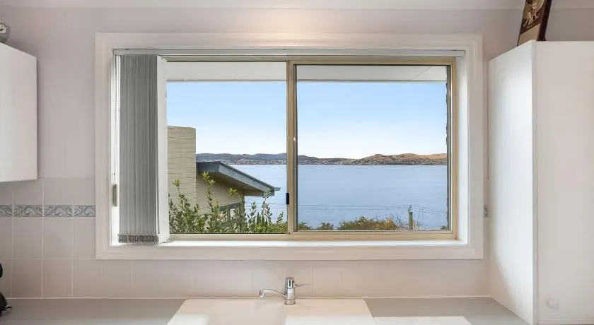 Seaside Serenity: Panoramic Waterfront Retreat - Image 1