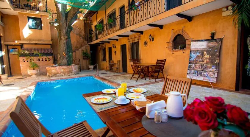 Mansion Colonial Boutique Hotel Pool Jacuzzi Bar Restaurant by BTC Group Crypto - Image 1
