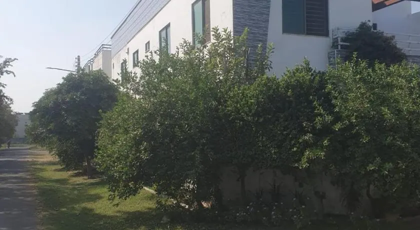 A fully furnished one kanal corner house with installed solar system hybrid and net metering near park with portable water suply - Image 1