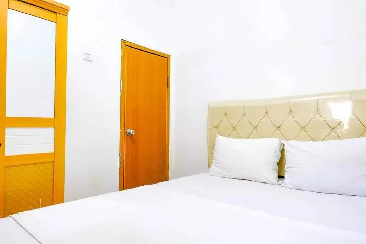 Snow White Residence near Grogol Mitra RedDoorz - Image 1