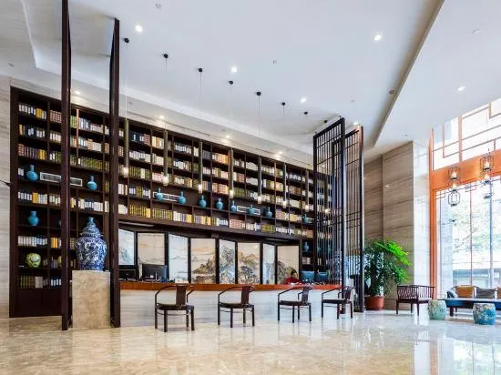 Huawen International Hotel - Image 1