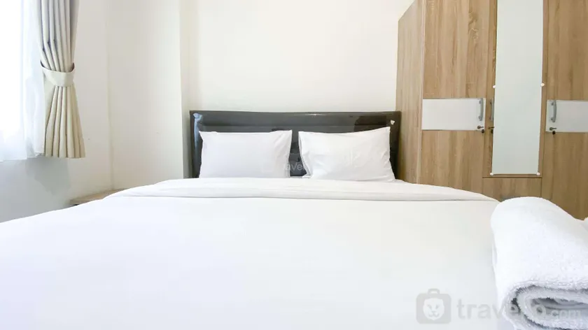 Nice 2BR at Podomoro Golf View By Travelio - Image 1