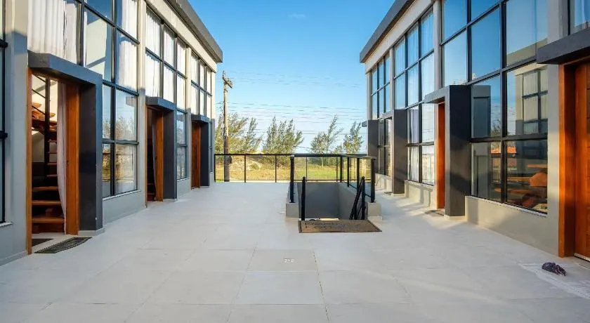 Lofts completos e modernos em Jaguaruna a 50m da Praia - PLO - Image 1