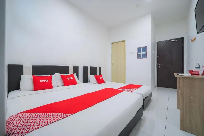 Hotel O Sp Berlian Inn - Image 1