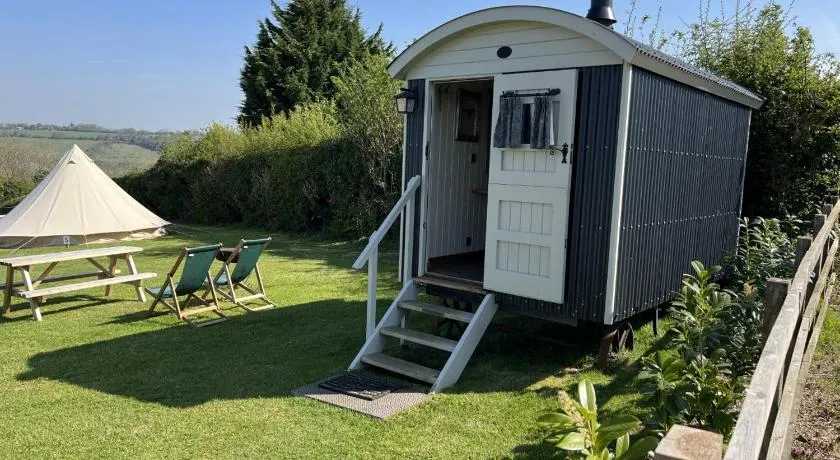 Home Farm Shepherds Hut with Firepit and Wood Burning Stove - Image 1