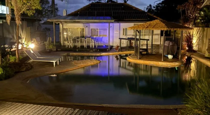 Waterfront Oasis Lakefront Villa with Pool and Sauna - Image 1