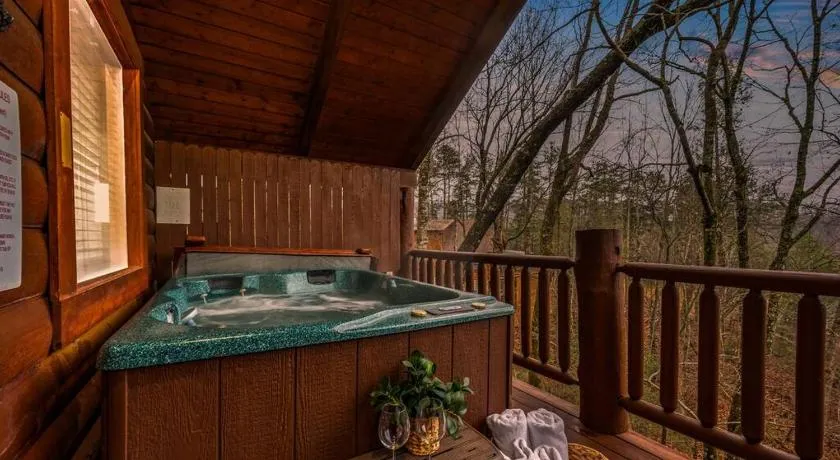 Cozy Log Cabin - Hot Tub, Fireplace, Pool Table, Porch swing and great views!  - Image 1