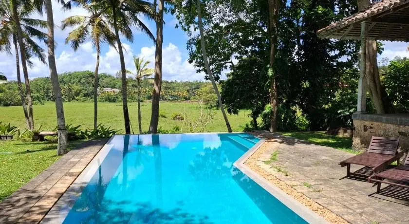 Villa Stone Well Garden - Villa de 3 chambres avec piscine à débordement parmi les rizières - Image 1