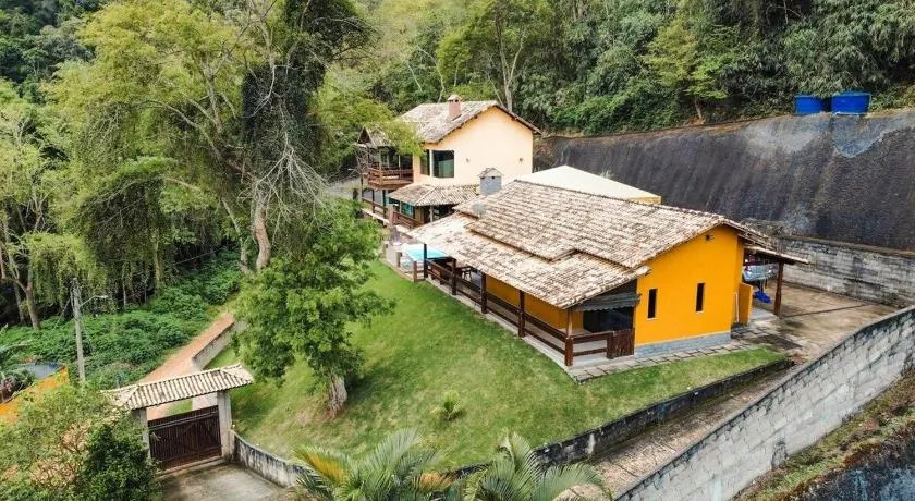 Toca do Dino - casa aconchegante com vista, lareira, piscina e área kids - Image 1