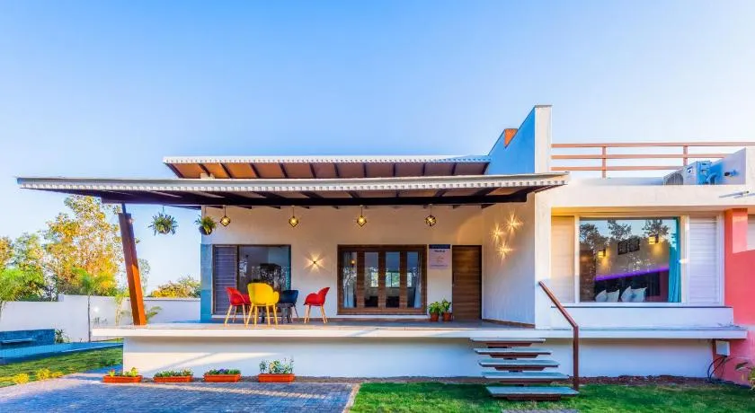 SaffronStays Blue Jasmine - twin 2BR pet-friendly villas with plunge pool, gardens & birdwatching near Sula Vineyard - Image 1