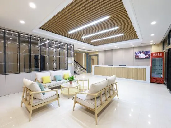 Yuxian Junyue Business Hotel - Image 1