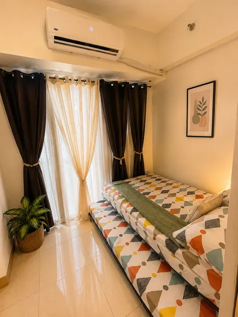 Lovely 1BR Condo @ SM Southmall w/ Netflix & High Speed WIFI - Image 1