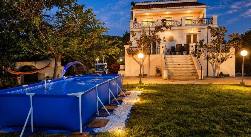 Luxury 6BR Villa, Garden Oasis, near Schinia Beach - Image 1