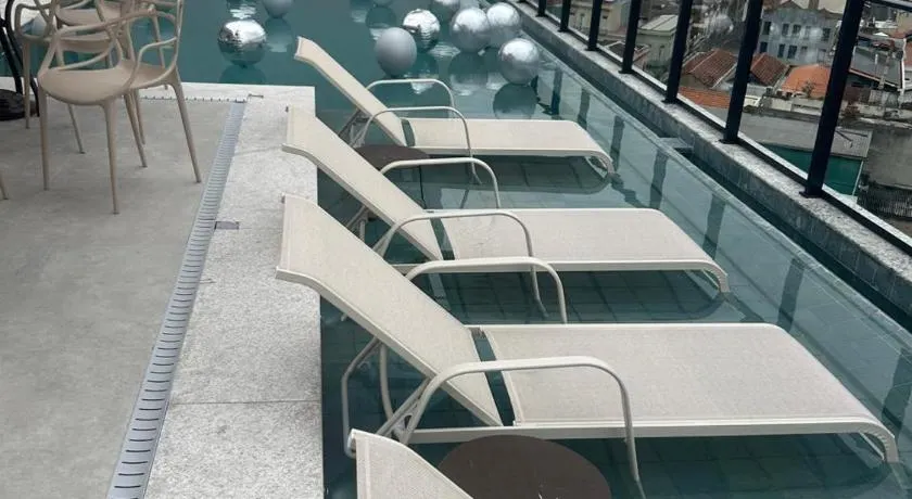 BUENO - Studio novo com rooftop, piscina e vista incrível - Image 1
