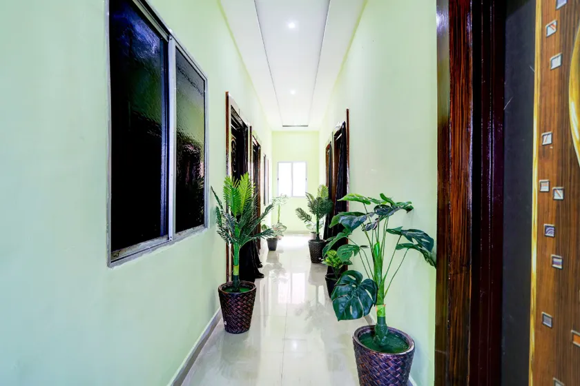 Hotel O Happy Stay Guest House - Image 1