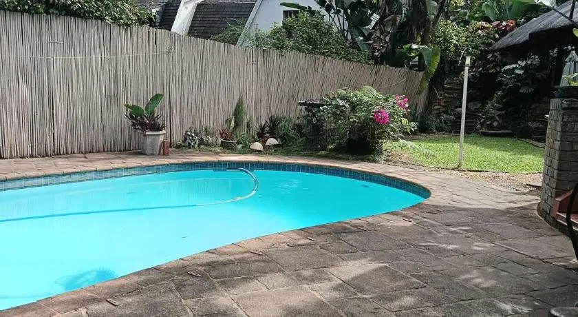 Executive Double room-2 bedrooms, lounge, TV, with private bathroom, patio - Image 1