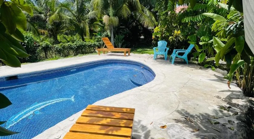 Pangea Lodge Tropical Vibe Home with Shared Pool - Image 1