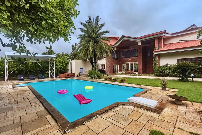 SaffronStays Ananya - 4BR villa with pool, minibar & game room near river Ullas in Karjat - Image 1