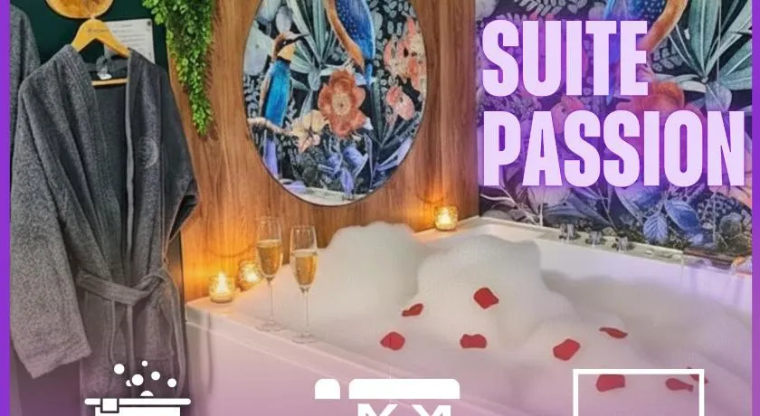 Suite Passion - Jacuzzi privé - Table massage - Image 1