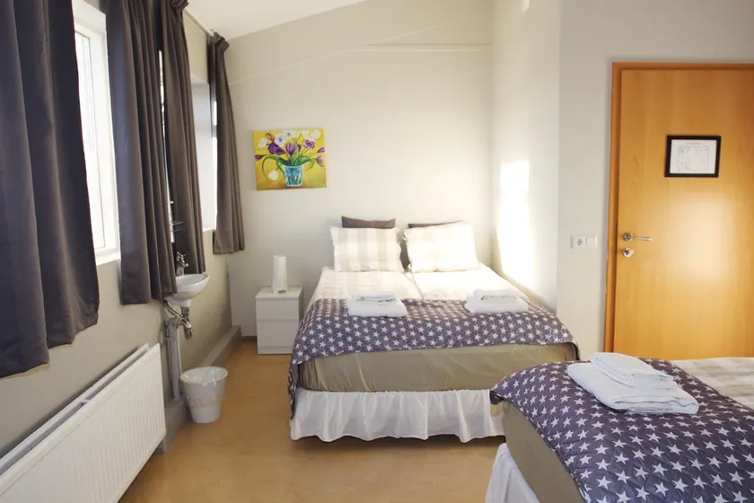 Alfar Guesthouse- Triple Room 4 - Image 1