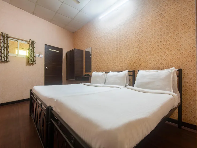 Capital O Hotel Shimaya - Image 1