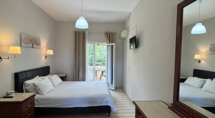 Olive Garden Studios & Apartments - Image 1