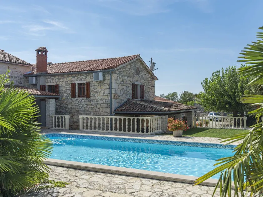 Stone holiday house with a spacious yard and private pool - Image 1