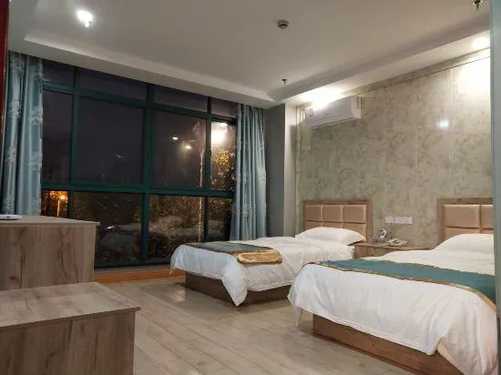Pinghu liduo sheng business hotel - Image 1