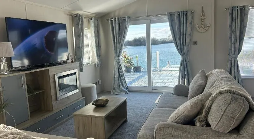 Chichester Lakeside Holiday Park Lakefront Lodge - Image 1