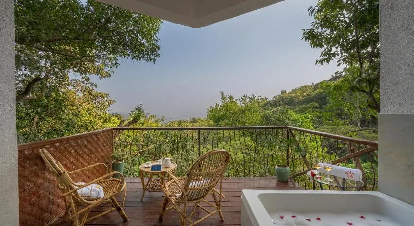SaffronStays Raanwaara Luxe - 2BR villa with dual balcony jacuzzis, infinity swing & private waterfall, luxurious escape - Image 1