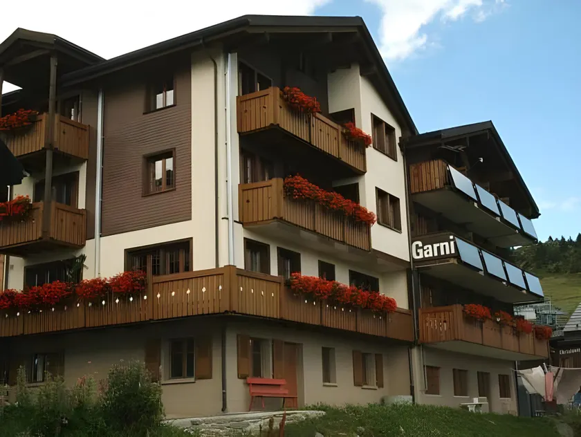 Familienhotel Garni Sporting - Image 1