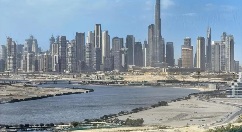 FirstStay Homes - Creek Rise Tower 2 - 1BR with Creek Views, Panoramic Living, Dubai Creek Harbour - Image 1