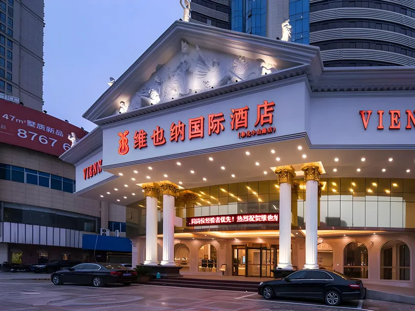 Vienna International Hotel Ningbo Fenghua Yintai Wanda Plaza - Image 1