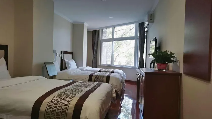 Super 9 Express Hotel - Image 1