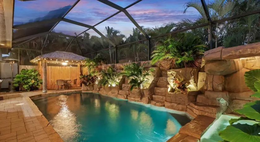 Coral Falls-Private Resort-Style Retreat with Pool, Spa, Tiki Hut - Image 1