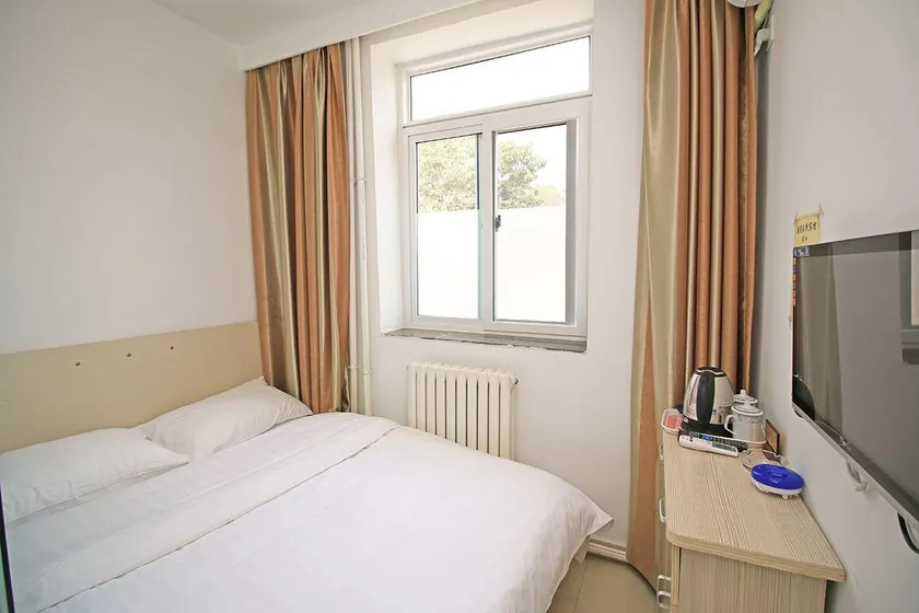 Xinhao Risheng Hotel - Image 1