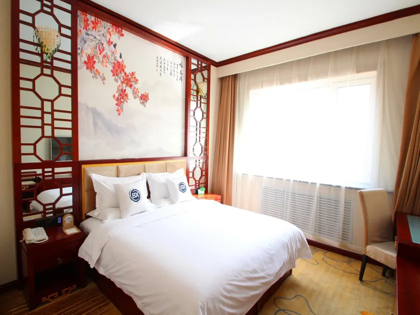 Harbin Baixiang Holiday Hotel - Image 1