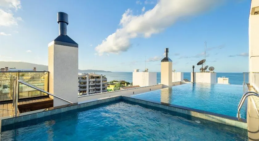 Aptos em prédio com piscina a 180m da Praia em Bombinhas - SFRs - Image 1