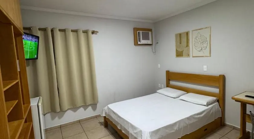 Bica Conveniência e Hotel - Image 1