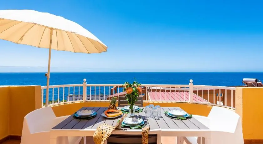Beachfront triplex with parking - Image 1