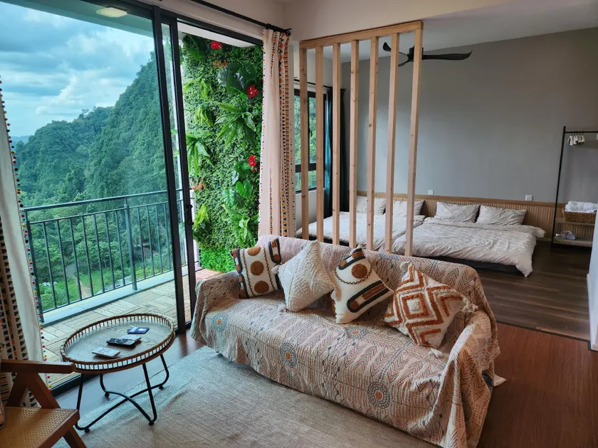 Unique Boho Style Condo with NETFLIX for up to 5PAX - Enjoy Mountain View while swimming at the Infinity Pool & Natural Hotspring Pool, 2mins walk to the Lost World of Tambun, Water Themepark at IPOH - Image 1